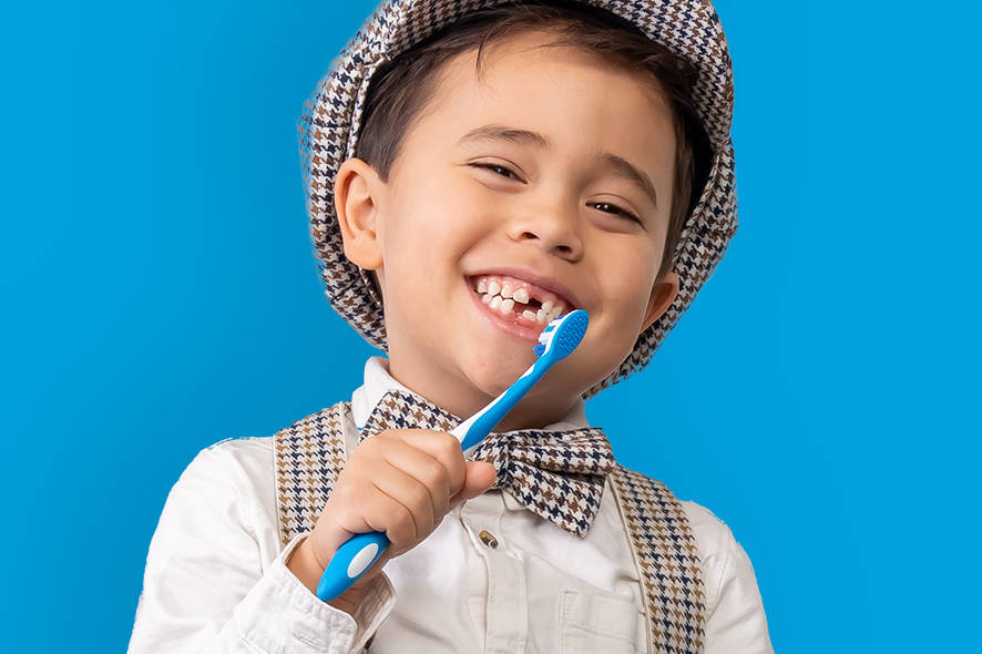 Boy brushing his teeth