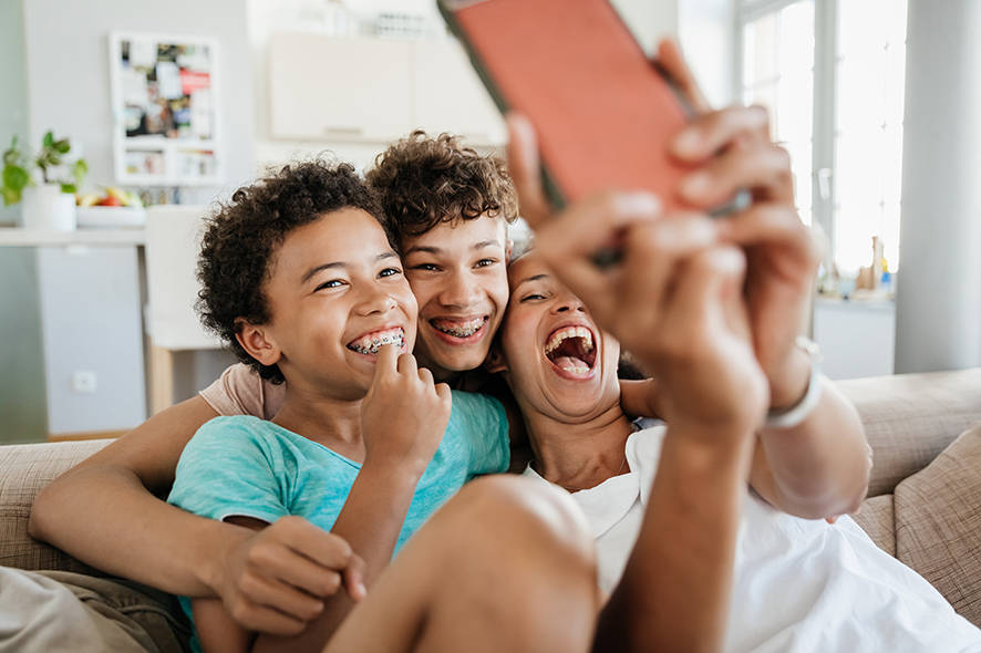 Mum and kids taking a selfie 